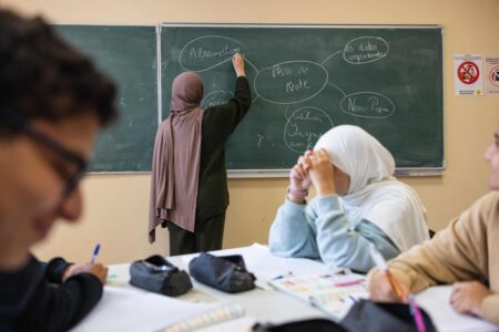Court overturns French decision to cut funding to biggest Muslim school – Reuters