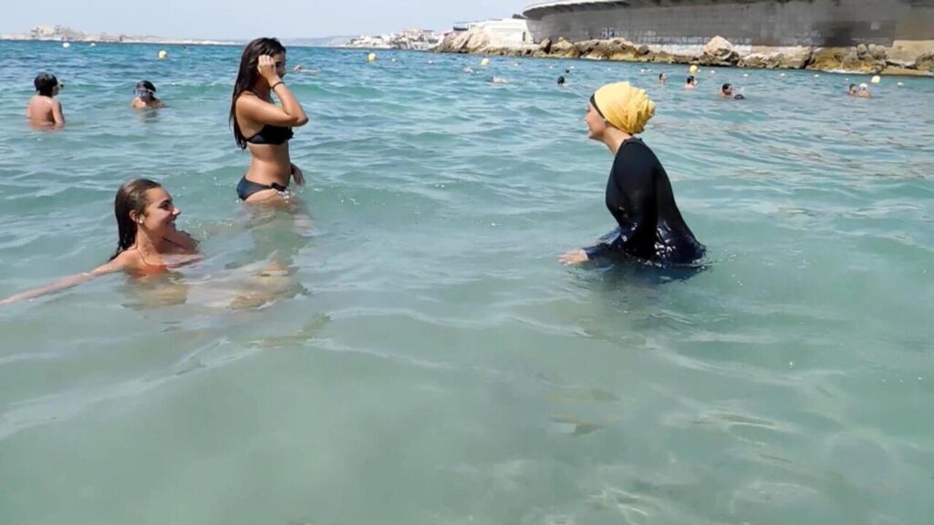 France to challenge Grenoble’s move to allow burkinis in public pools – The Guardian