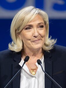 French politics to get ‘even messier’ as far-right figurehead Le Pen rails against ban, analysts warn – CNBC