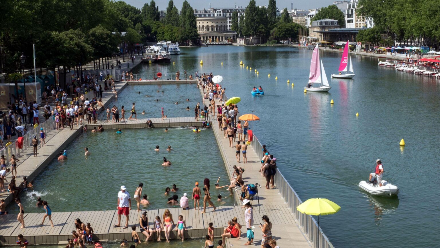 With the Seine open for swimming in Paris, tourists and residents embrace it as temperatures soar – PBS